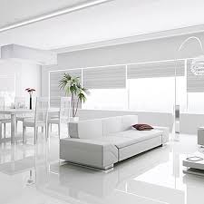 Living room that doubles as family room with one sofa, one loveseat and two ornate wooden chairs all facing flat screen television mounted in wood shelving surrounded by a brick wall. Hugedomains Com White Laminate Flooring Living Room Tiles Tile Floor Living Room