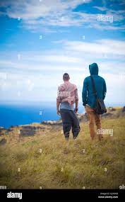 Two men on edge rano hi-res stock photography and images - Alamy