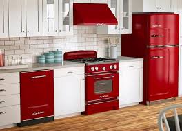 This kitchen definitely proves there's no such thing as too much blue. 20 Modern Kitchens With Cool Retro Appliances Retro Kitchen Appliances Retro Kitchen Colorful Kitchen Appliances