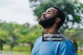 calm person meditating outdoors