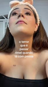 Girl Applying Mascara in a Rush