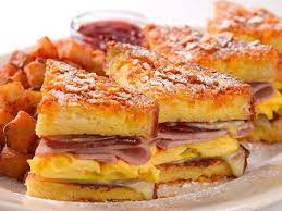 A quick and easy sandwich with ham, turkey and swiss slices, dipped in an egg/milk mixture and fried to a golden brown. Monte Cristo Sandwich The Cheesecake Factory