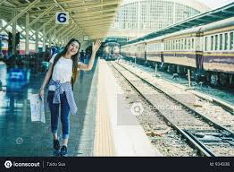 Premium Asia Woman Traveler Feeling Happiness And Greeting Her Friend Before Go To Travel At The Train Station Photo Download In Png Jpg Format Female Travel Train Station Vacation Photos