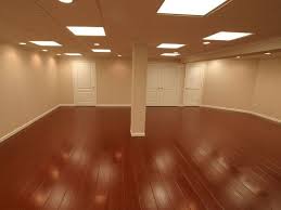 Wood Laminate Basement Floor Finishing Bangor Portland Rochester Me And Nh Warranted Bas Basement Flooring Waterproof Faux Wood Flooring Basement Flooring