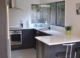 A breakfast bar is either a full kitchen island or a countertop overhang with a height that has enough room for the legs and a size that can accommodate ample room for meals. Small U Shaped Kitchen Designs Best Home Decoration World Class Small Kitchen Layouts Budget Kitchen Remodel Kitchen Remodel Small