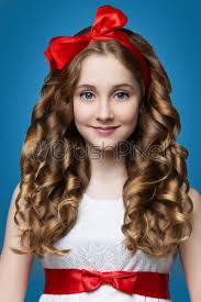 It could be a messy curly hairstyle. Teen Girl With Curly Hair Stock Photo Crushpixel