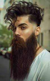 5 Haircuts For Men That Are Worth Trying In 2020 Man Bun Curly Hair Long Beard Styles Curly Hair Fade