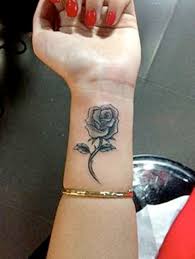 Yellow rose tattoo is a symbolism of friendship. 21 Small Rose Tattoo On Wrist Designs Images