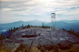 It is not unusual to see cars parked along the roadside at this very popular trailhead. Ampersand Mountain Historic Saranac Lake Localwiki