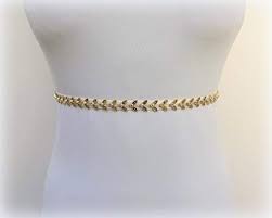 Stunning one gram gold vadanam with pearl hangings. Amazon Com 0 4 Womens Thin Ivory Elastic Gold Leaf Waist Belt Handmade