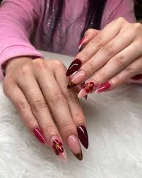 Paris Beauty Studio | A romantic blend of deep burgundy and nude pink,  accented with trendy amber details—each nail is a work of art. Elegance  meets personality,... | Instagram