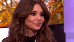 Cheryl comforted by Nadine Coyle