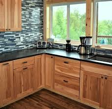 The Stunning Variation Of These Hickory Cabinets Fits Beautifully In This Transitional Kitchen Tr Hickory Kitchen Cabinets Hickory Cabinets Kitchen Renovation