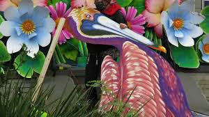I want some mardi gras float flowers for my house! Mardi Gras Spirit Lives On In New Orleans In Colorful House Floats