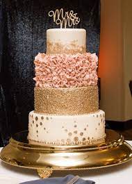 Blush And Gold Colored Four Tier Wedding Cake Weddingcakes Blush Wedding Cakes Pink Wedding Cake Rose Gold Wedding Cakes