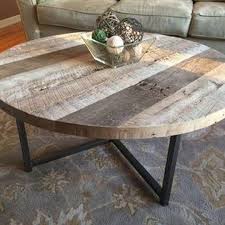 Rustic round oak coffee table with metal base: 84 Wonderful Coffee Table Design Ideas Https Www Futuristarchitecture Com 14162 Coffee Tables Htm Round Wood Table Custom Coffee Table Coffee Table Farmhouse