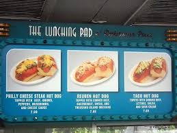 Lunching Pad Offers New Gourmet Hot Dog Menu The Disney Food Blog Gourmet Hot Dogs Food Hot Dog Toppings