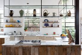 Besides, hanging wine glass rack under the cabinet gives a modern look to your kitchen bar. Trending Suspended Kitchen Shelving Centsational Style