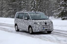 Vw's transporter series is actually the direct successor to the microbus, with the original t1 generation first sold here as the bus. 2021 Volkswagen T7 Transporter Spied With Plug In Drive Golf Infotainment Autoevolution