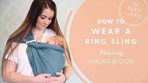 For newborns the front carry chest to chest position is suggested as shown in the ring sling tutorial above. How To Wear A Ring Sling Featuring The Sakura Bloom Youtube
