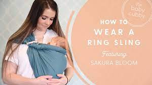 The ring sling allows you to wear a newborn, a small baby and a toddler. How To Wear A Ring Sling Featuring The Sakura Bloom Youtube
