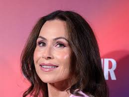 Minnie Driver, 54, makes rare appearance with son, 16, who towers over herl 