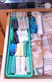 How To Declutter Kitchen Towels Dish Cloths Kitchen Drawers Declutter Kitchen Kitchen Storage Organization