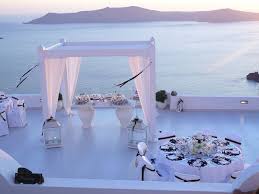 Reception Venue At Sunset Beautiful Beach Wedding Dana Villas Santorini Wedding