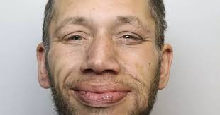 Prolific Huddersfield criminal stopped man's car and beat him before  stealing phone and bank card