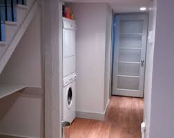When updating the basement kitchen, suzanne dimma placed upper cabinets directly beneath an immovable bulkhead. Renovation Services Halifax Ports East Construction