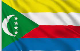 In 1963, about 12 years before independence, the country adopted a green flag with crescent on the upper hoist and four diagonal stars. Comoros Flag