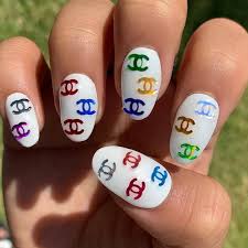 First, paint your nails with flowery designs of different colors. Acrylic Nails Designs Chanel Nail Stylists Say Acrylics Are Easier To Brush And Paint Because They Offer A Smoother Surface Than Groch Na Scianie