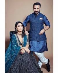 Kareena Kapoor Dresses Buy Kareena Fashion Style Dresses Peach embroidered party wear designer palazzo suit.