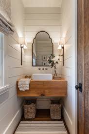 Using simple molding and paint then, changing your vanity countertop, faucet, and lighting fixture can help create the designer look. Bath Maritim Gastetoilette Atlanta Von Jessica Bradley Interiors