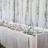 Wedding reception table decoration made using fresh flowers. 1
