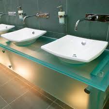 Bathroom vanity color and material used: Glass Vanity Top Washroom Washroom Limited