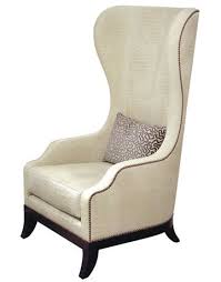 A chic wing back armchair or a small sofa in a lavish style. High Back Tall Chairs High Back Chair Seating