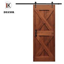 The surface of a plank island or counter top shows off the face grain of wood. China Modern Design Wood Veneer Knotty Pine Interior Sliding Plank Barn Door China Sliding Wooden Door Doors Wooden Solid