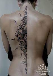 12 Elegant Tattoos Spine Tattoos For Women Elegant Tattoos Tattoos