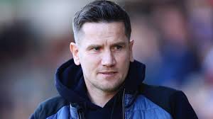 Lee Bell: Crewe boss stays despite approach from another club