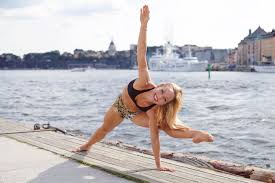 Tripod headstand is used repeatedly as a transition into and out of arm balances. Gastlarare Kino Macgregor Workshop Atmajyoti Yoga
