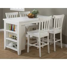 Cushioned dining chairs are covered in faux leather and are tufted and slide neatly under the table when not in use. Madaket Reclaimed Counter Height Table 4 Chairs Savvy Furniture