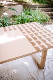 We added more flowers and leaves around that design, then a diamond pattern on the table's edges, apron and legs. How To Stencil Paint An Outdoor Table Collective Gen