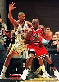 Indiana Pacers Guard Jalen Rose Defends As Chicago Bulls Guard Michael Jordan Backs Toward The Basket Durin Basketball Shorts Girls Michael Jordan Jordan Bulls