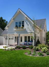 They are gorgeous houses with grand features like covered porches, strong entry columns, and dormer windows. Modern Twist On A Traditional Cottage Style Home In Minnesota Craftsman House Modern Farmhouse Exterior House Exterior