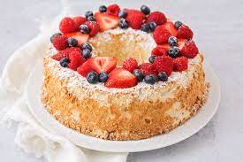 It's pristine white on the inside with a chewy light brown crumb around the exterior. Easy Angel Food Cake Recipe Lil Luna