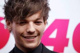 Is Louis Tomlinson's 'mystery pool girl' the daughter of a millionaire  menswear designer?