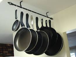 Pot Rack Rather Than Storing Your Various Pots And Pans In Cabinets Be More Space Efficient And Hang T Curtain Rods Kitchen Organization Small Projects Ideas