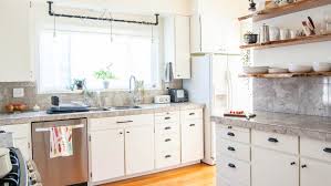 We could hide those ugly plastic bins, add an additional work surface and get two bonus drawers all in one piece! Here S How Hidden Cabinet Hacks Dramatically Increased My Kitchen Storage Apartment Therapy