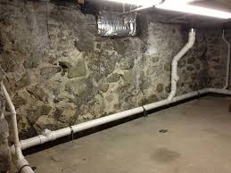 Holding the cement finishing trowel upside down, plop some mortar on its blade. Stone Foundation Repair Basement Waterproofing Massachusetts